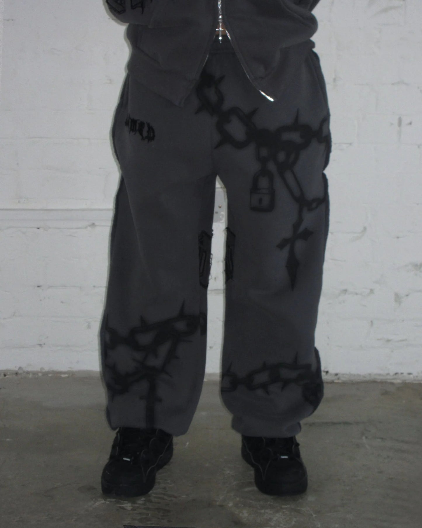 chains sweatpants cast iron
