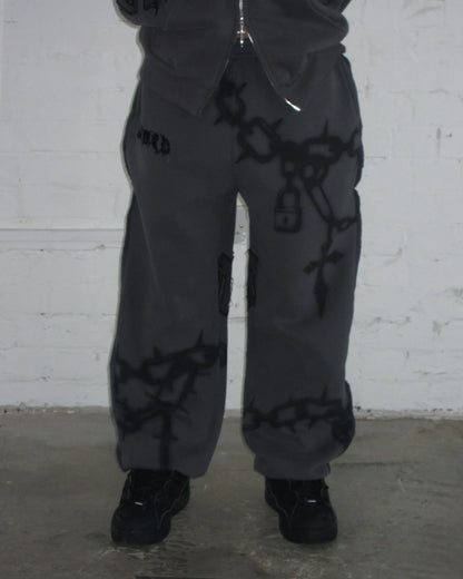chains sweatpants cast iron